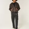 Tvättade svarta lösa målarjeans Tvättade svarta lösa målarjeans