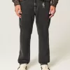 Tvättade svarta lösa målarjeans Tvättade svarta lösa målarjeans