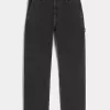 Tvättade svarta lösa målarjeans Tvättade svarta lösa målarjeans