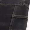 Tvättade svarta lösa målarjeans Tvättade svarta lösa målarjeans