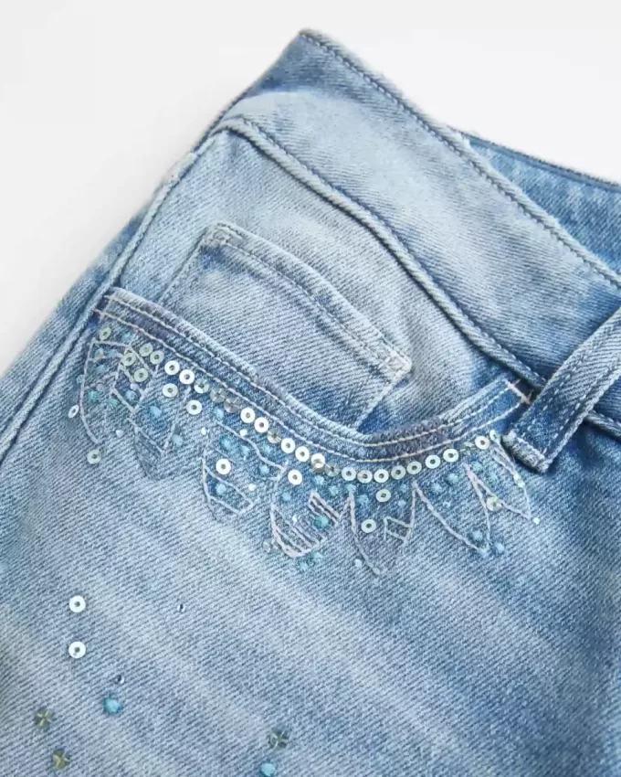Ultra Low-Rise Distressed Light Wash Sequin Flare Jeans Ultra Low-Rise Distressed Light Wash Sequin Flare Jeans