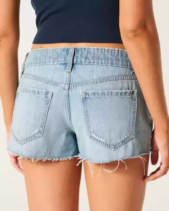 Ultra Low-Rise Ripped Medium Wash Mini jeansshorts