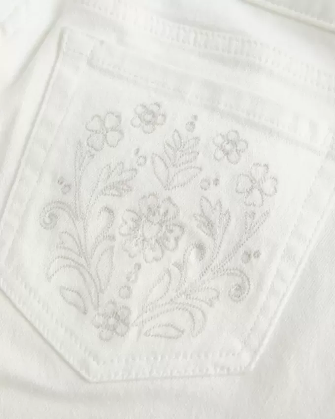 Ultra Low-Rise White Broderade Pocket Flare Jeans Ultra Low-Rise White Broderade Pocket Flare Jeans