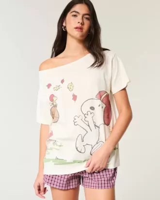 Överdimensionerad off-the-shoulder Snoopy grafisk t-shirt