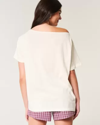 Överdimensionerad off-the-shoulder Snoopy grafisk t-shirt