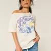Överdimensionerad Off-the-Soulder Kauai grafisk t-shirt Överdimensionerad Off-the-Soulder Kauai grafisk t-shirt