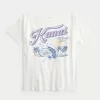 Överdimensionerad Off-the-Soulder Kauai grafisk t-shirt Överdimensionerad Off-the-Soulder Kauai grafisk t-shirt