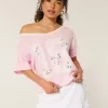 Överdimensionerad Off-the-Soulder Varsity Floral Graphic T-shirt Överdimensionerad Off-the-Soulder Varsity Floral Graphic T-shirt