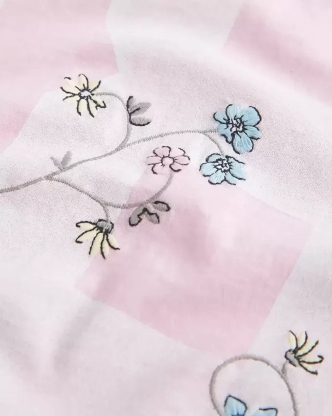 Överdimensionerad Off-the-Soulder Varsity Floral Graphic T-shirt Överdimensionerad Off-the-Soulder Varsity Floral Graphic T-shirt